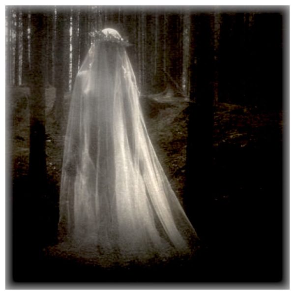ghostly-figure-white-cloak-is-shown-dark-room_956363-20786